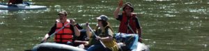 Raft full of people on a river