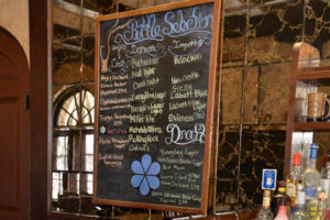 Bar specials on a chalkboard at a bar